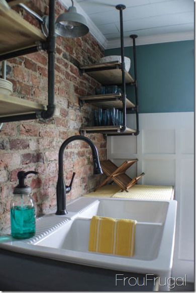 Kitchen Remodel - After - Exposed Brick Wall with Plumbing Pipe Open Shelves